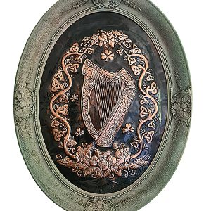 The Harp among Celtic knots wreath in a restored vintage frame.